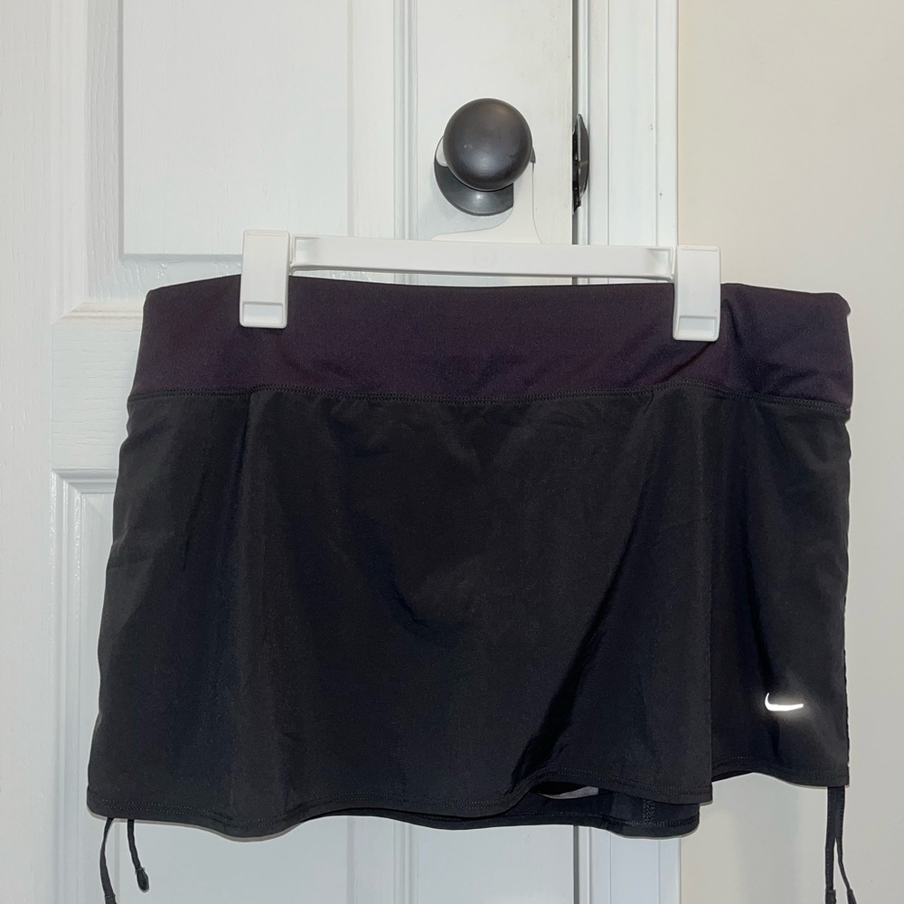 dark grey nike skirt with built in shorts (top band picks up purple but is grey)
